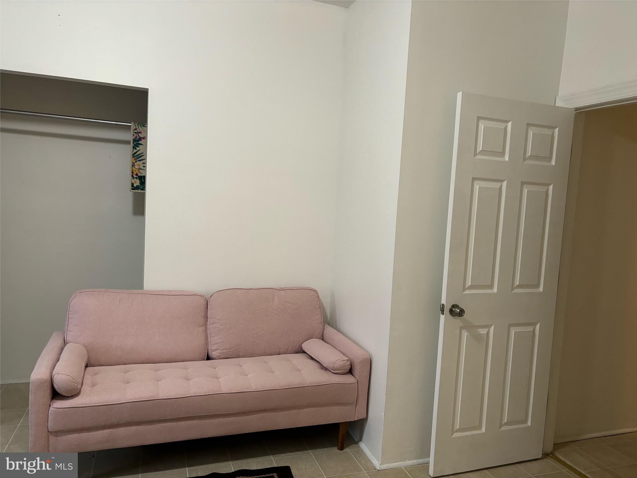 4328 Frankford Avenue, Unit 2A Philadelphia, PA 19124 - Photo 20 of 20 a living room with a couch