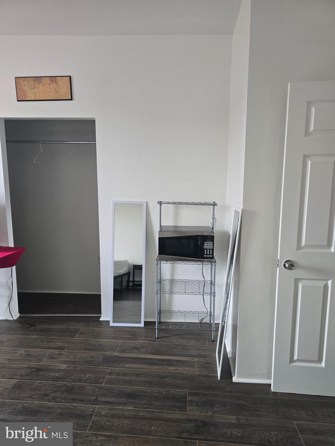 4328 Frankford Avenue, Unit 2A Philadelphia, PA 19124 - Photo 4 of 20 a view of a livingroom with wooden floor and a refrigerator