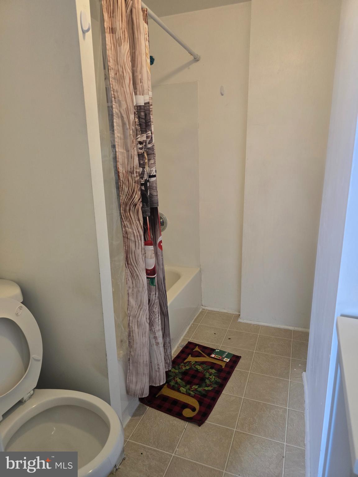 4328 Frankford Avenue, Unit 2A Philadelphia, PA 19124 - Photo 7 of 20 a bathroom with a toilet and shower