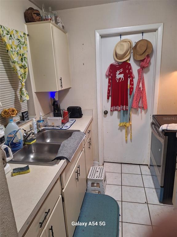 3762 Southwest 150th Loop Ocala, FL 34473 - Photo 3 of 25 a bathroom with a sink a mirror and shower