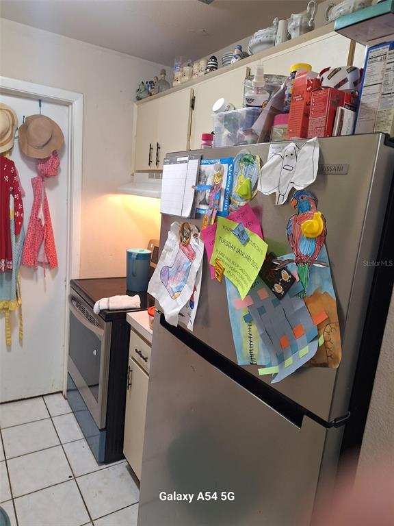 3762 Southwest 150th Loop Ocala, FL 34473 - Photo 5 of 25 a utility room with dryer and washer