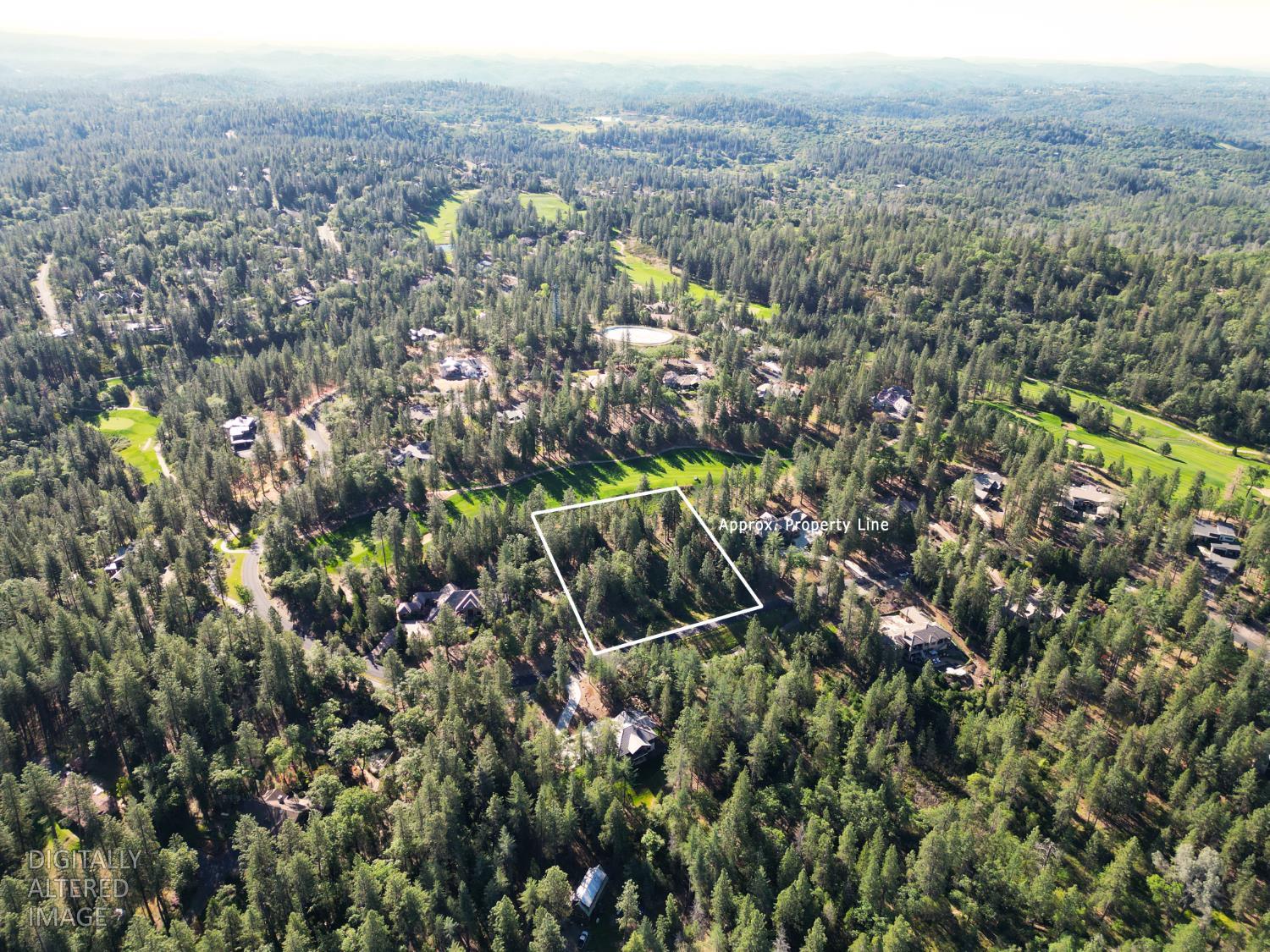 1711 The Point Meadow Vista, CA 95722 - Photo 26 of 33 an aerial view of residential house with green space and mountain view