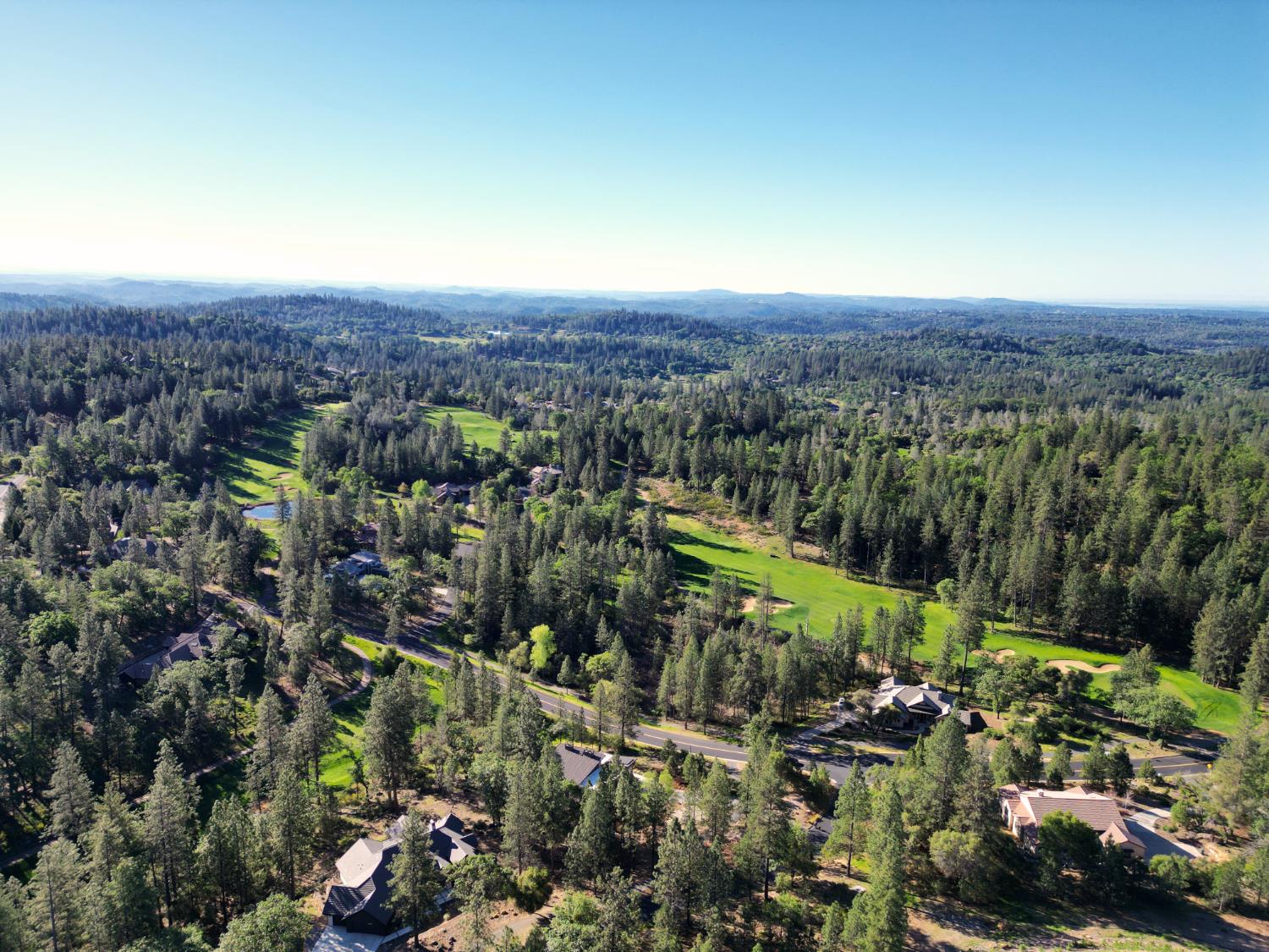 1711 The Point Meadow Vista, CA 95722 - Photo 31 of 33 a view of a city with lush green forest
