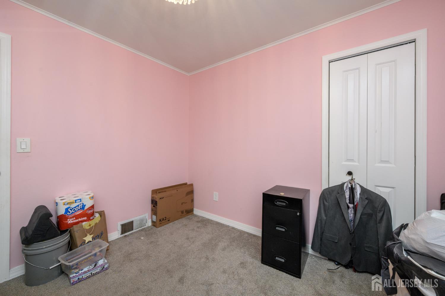 384 Cook Road Jackson, NJ 08527 - Photo 20 of 31 a living room with furniture and gym equipment