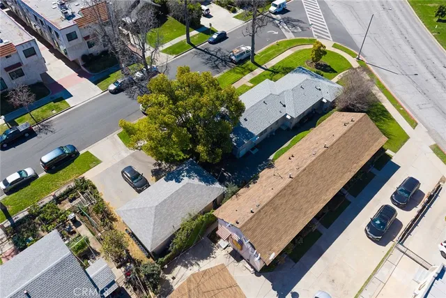 an aerial view of a house with a swimming pool