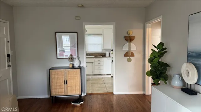 a room with cabinets and wooden floor