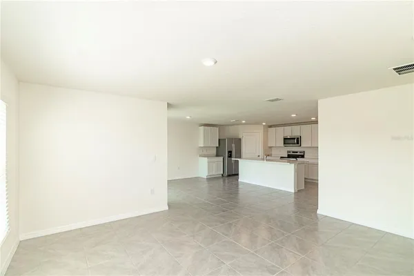 a view of a kitchen with a sink