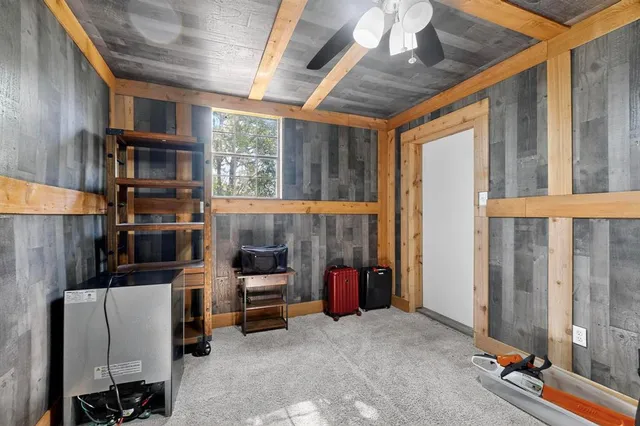 a view of a house with a back yard