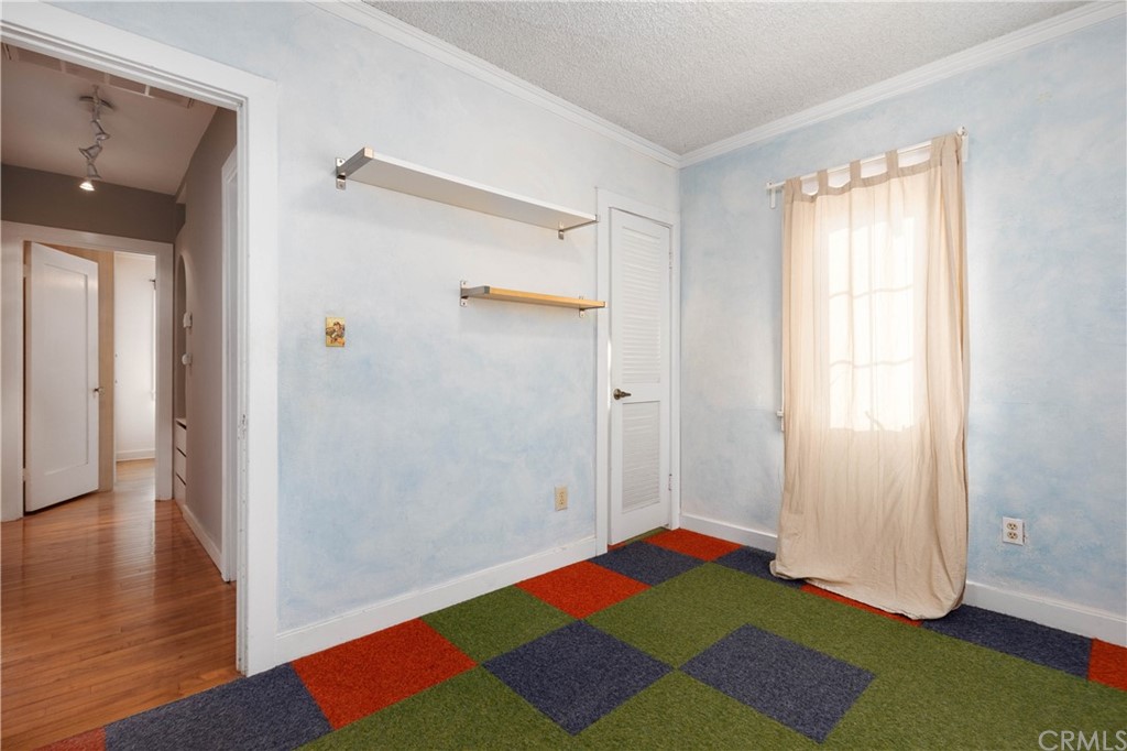 2537 Devonshire Lane Altadena, CA 91001 - Photo 15 of 23 a view of bedroom with window and hardwood floor