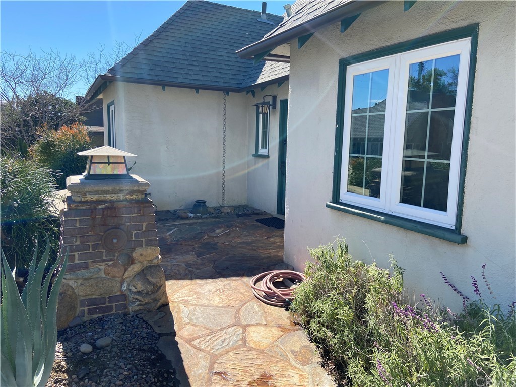 2537 Devonshire Lane Altadena, CA 91001 - Photo 3 of 23 a front view of a house with a yard