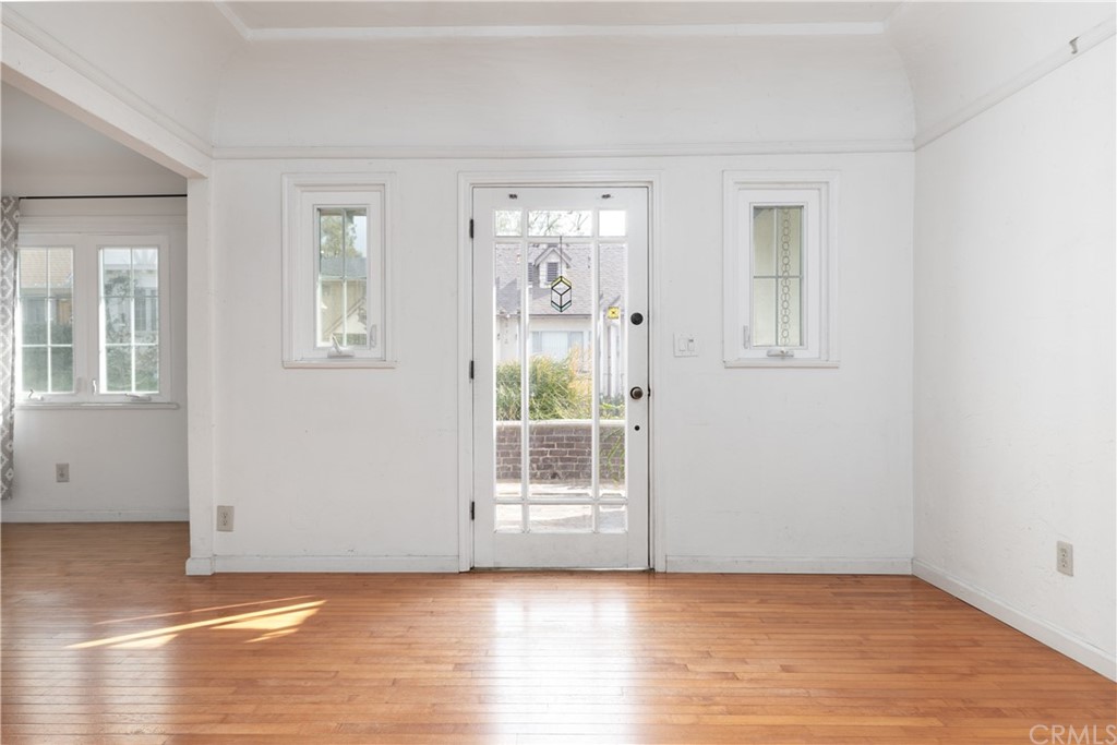 2537 Devonshire Lane Altadena, CA 91001 - Photo 6 of 23 a view of an empty room with wooden floor and a window