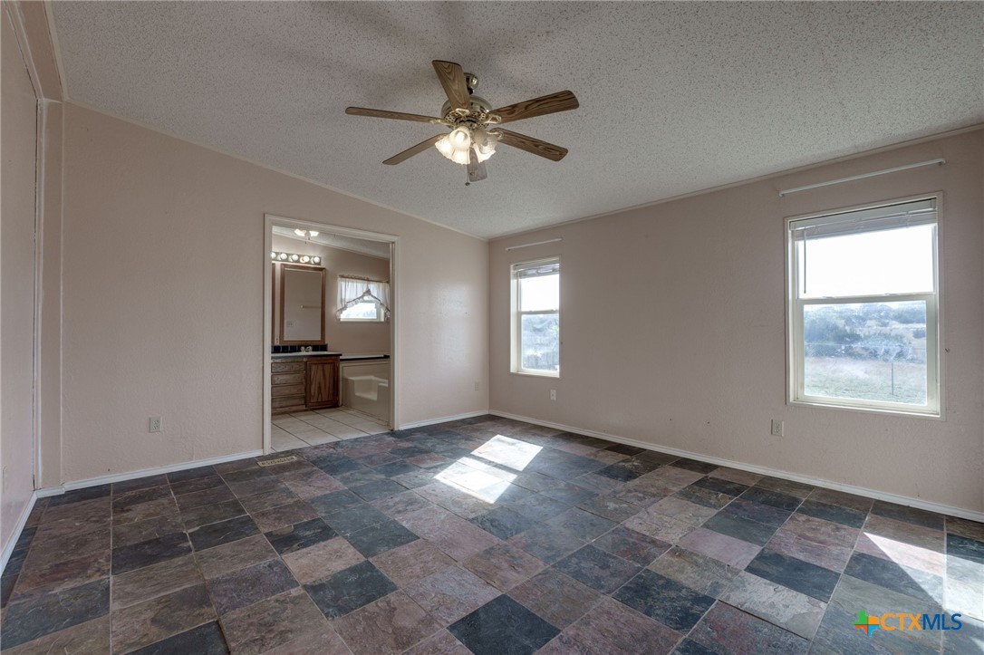 809 Crest Court Copperas Cove, TX 76522 - Photo 12 of 22 a view of an empty room with a window