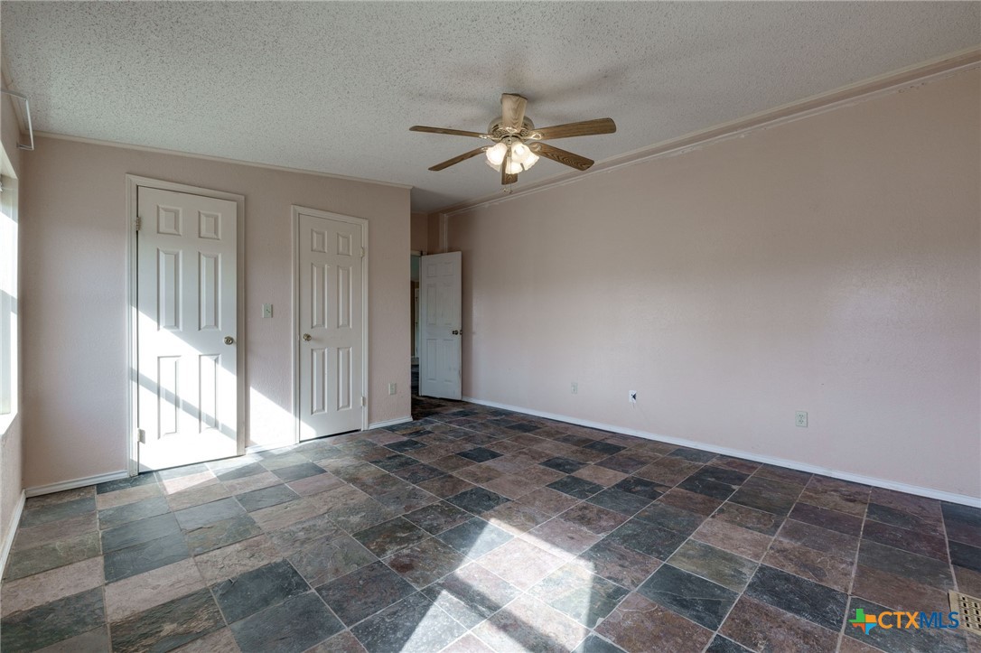 809 Crest Court Copperas Cove, TX 76522 - Photo 14 of 22 a view of an empty room with a window