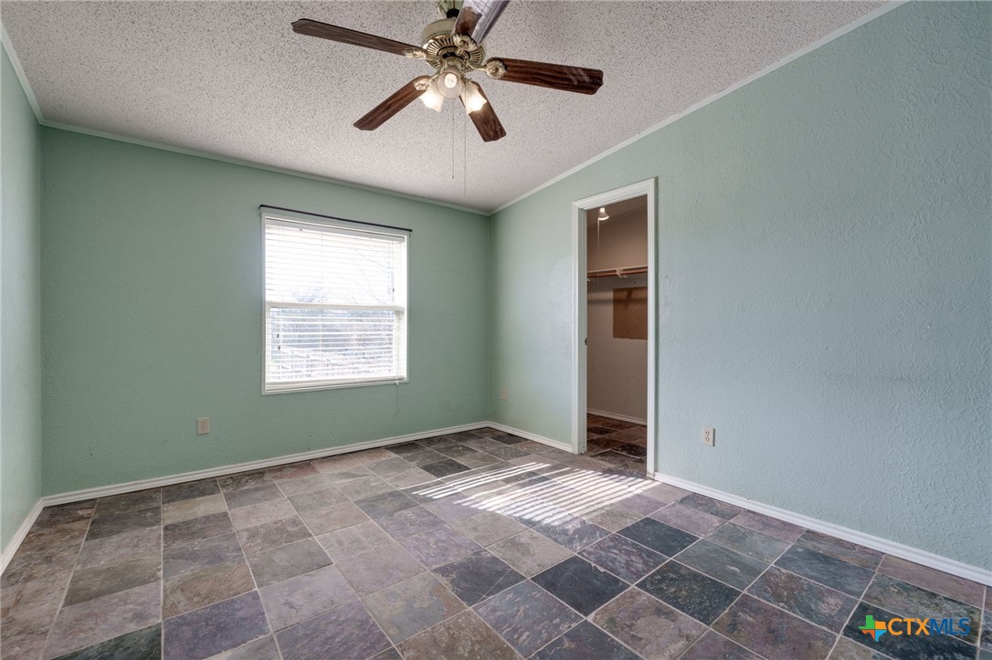 809 Crest Court Copperas Cove, TX 76522 - Photo 17 of 22 a view of an empty room with a window