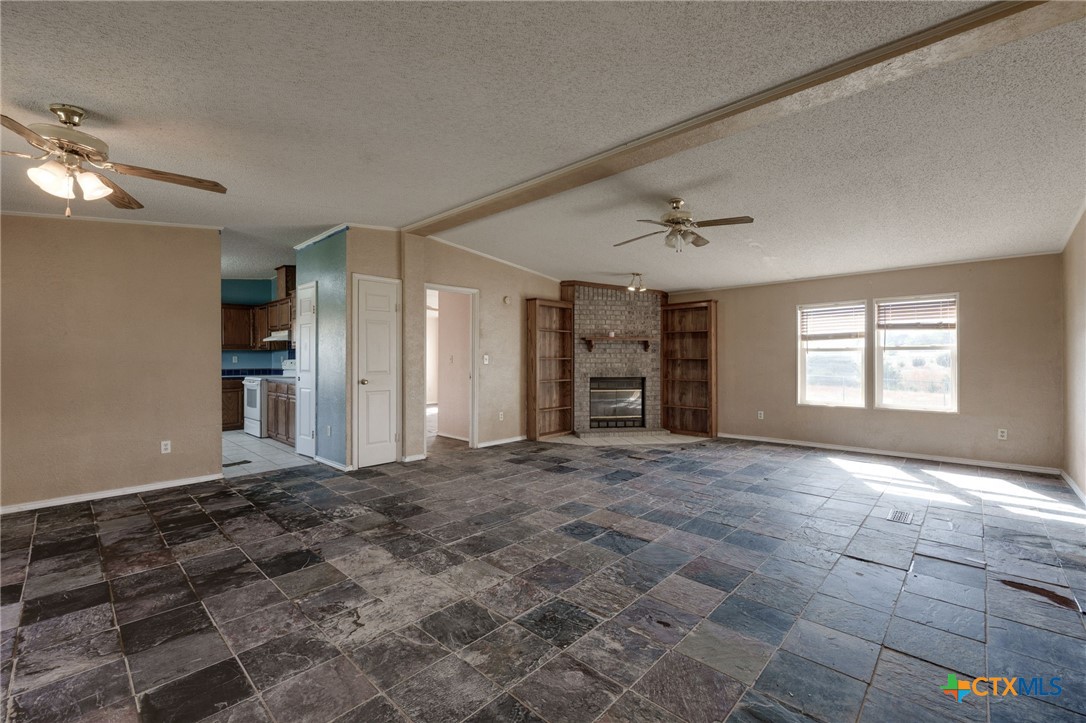 809 Crest Court Copperas Cove, TX 76522 - Photo 5 of 22 a view of an empty room with a window