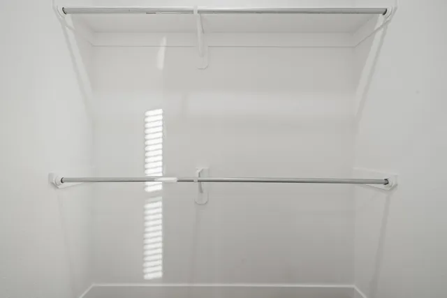 a view of small space with racks on the wall