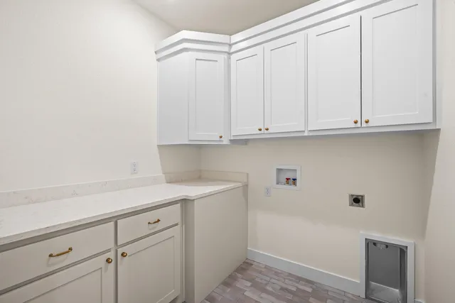a view of cabinets with wooden floor