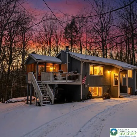 a front view of a house with garage