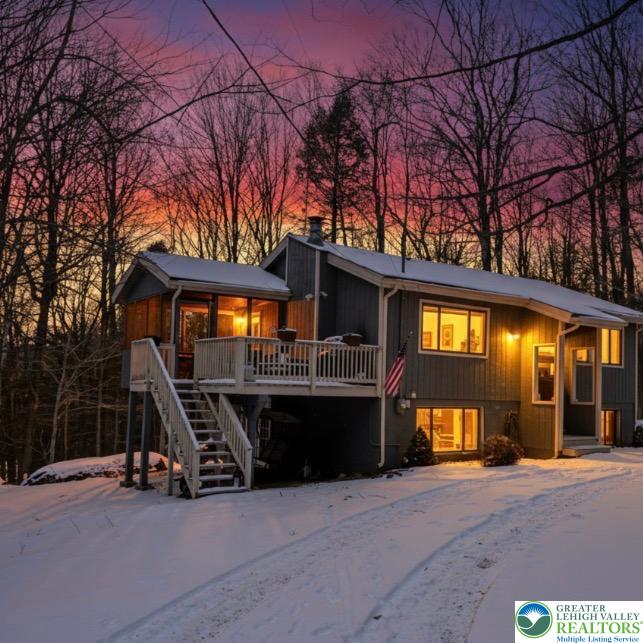 a front view of a house with garage