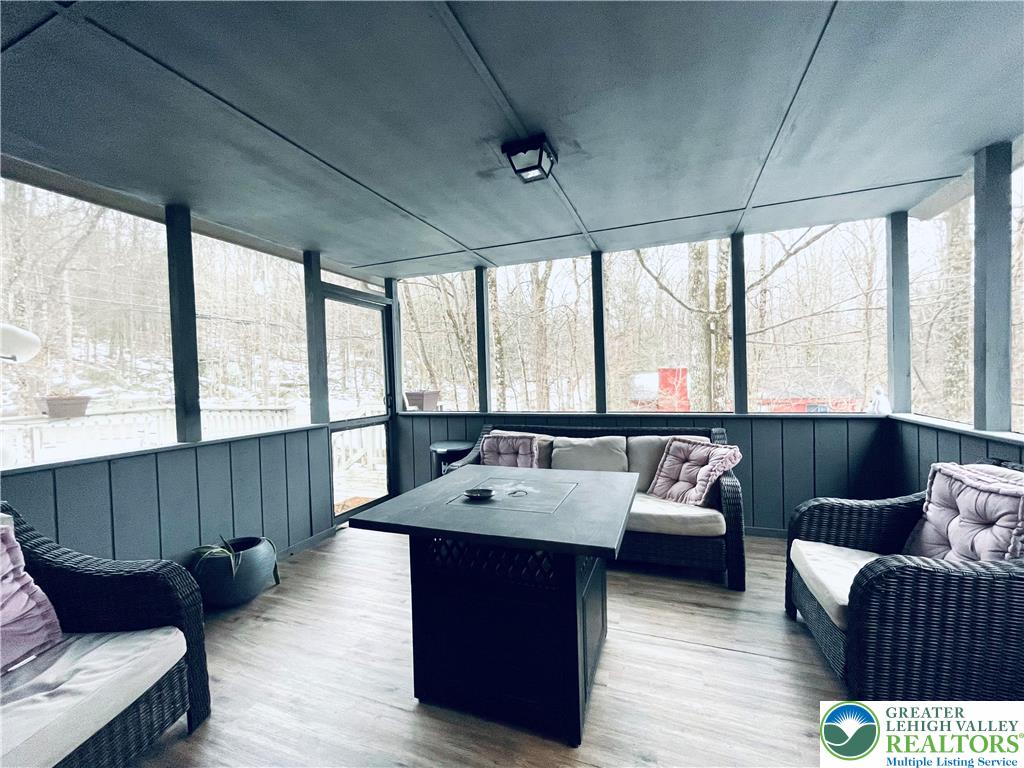 3104 Northgate Road Lake Ariel, PA 18436 - Photo 29 of 36 a living room with furniture and a large window