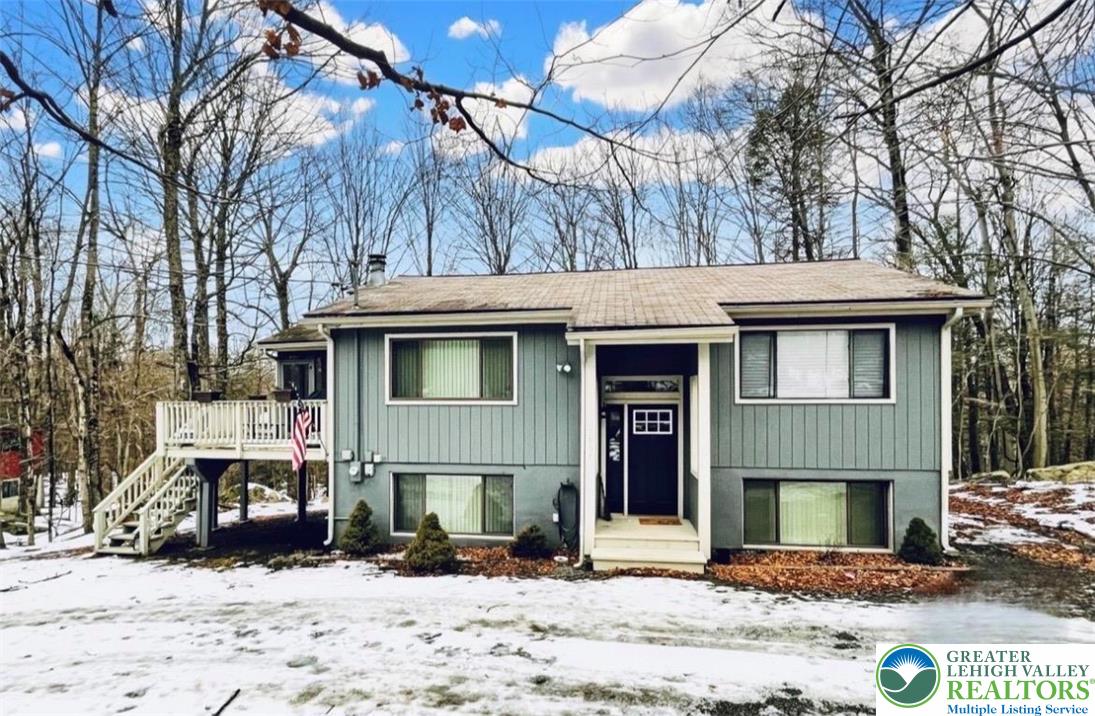 3104 Northgate Road Lake Ariel, PA 18436 - Photo 30 of 36 a view of a house with a yard covered with snow in the road