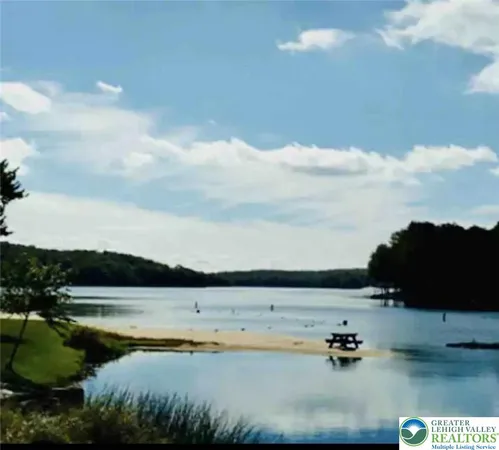 a view of swimming pool and lake view