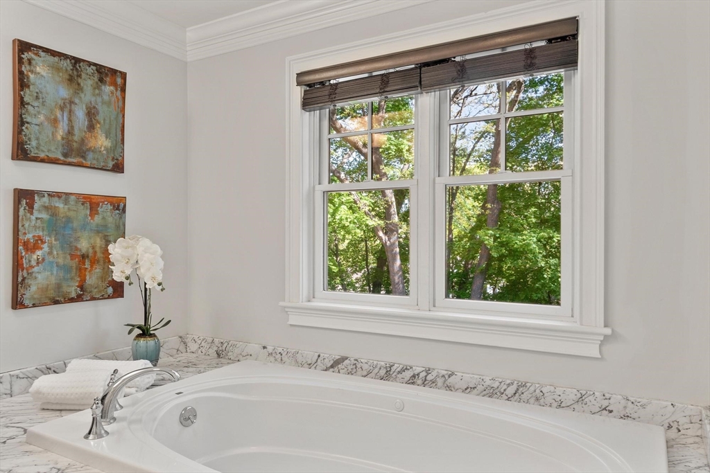 56 Old Marlboro Road Concord, MA 01742 - Photo 13 of 34 a bathroom with a bathtub and a shower