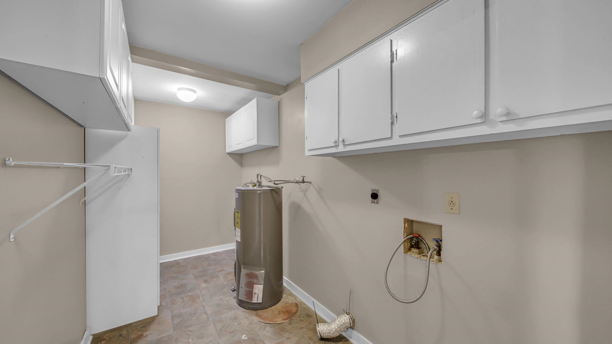 1214 Marshall Road Brighton, TN 38011 - Photo 13 of 19 a view of a storage & utility room with two washing machine
