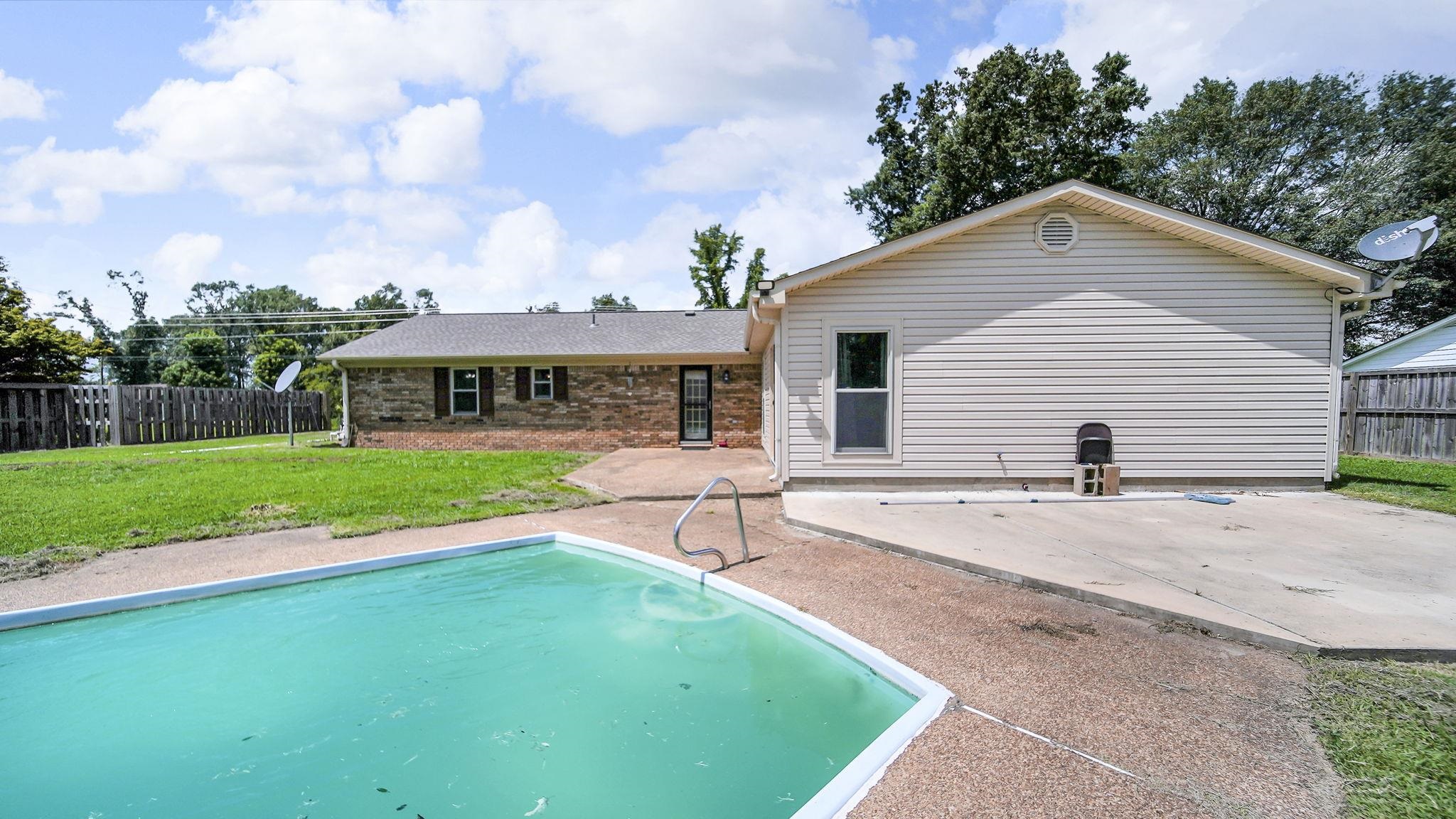 1214 Marshall Road Brighton, TN 38011 - Photo 15 of 19 a view of a house with a yard