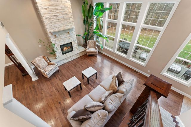 a kitchen with a sink stove and refrigerator