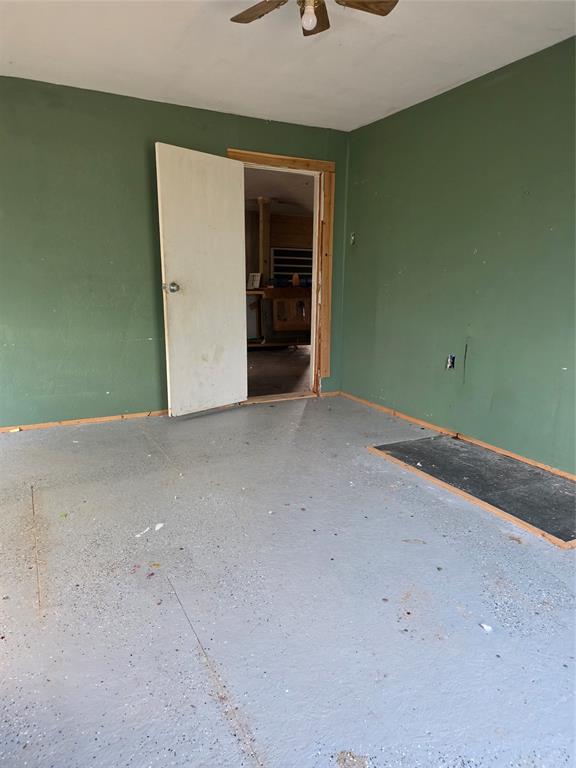 3830 County Road 4040 Whitewright, TX 75491 - Photo 18 of 27 an empty room with closet