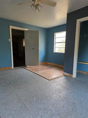 an empty room with windows