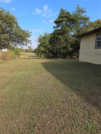 a view of an ocean from a yard