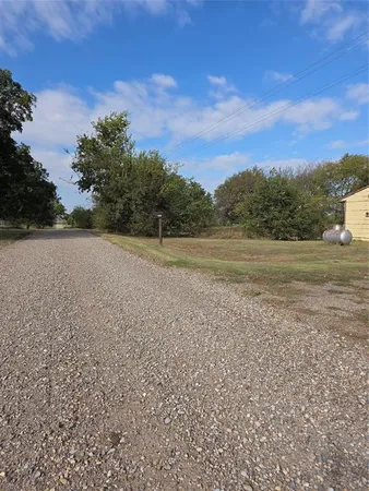a view of an outdoor space and a yard