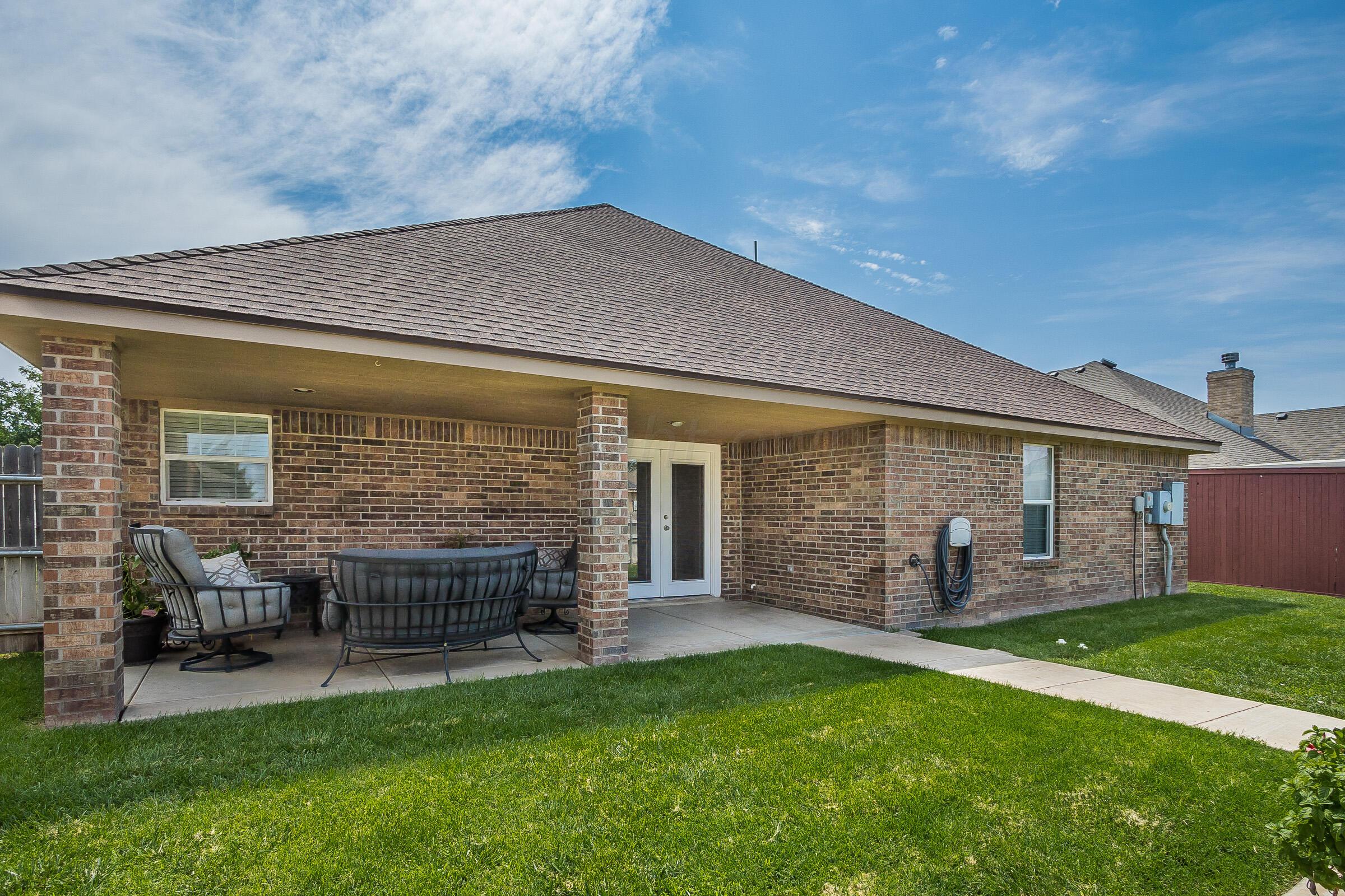 6502 Lexis Street Amarillo, TX 79119 - Photo 20 of 27 front view of a house with a yard