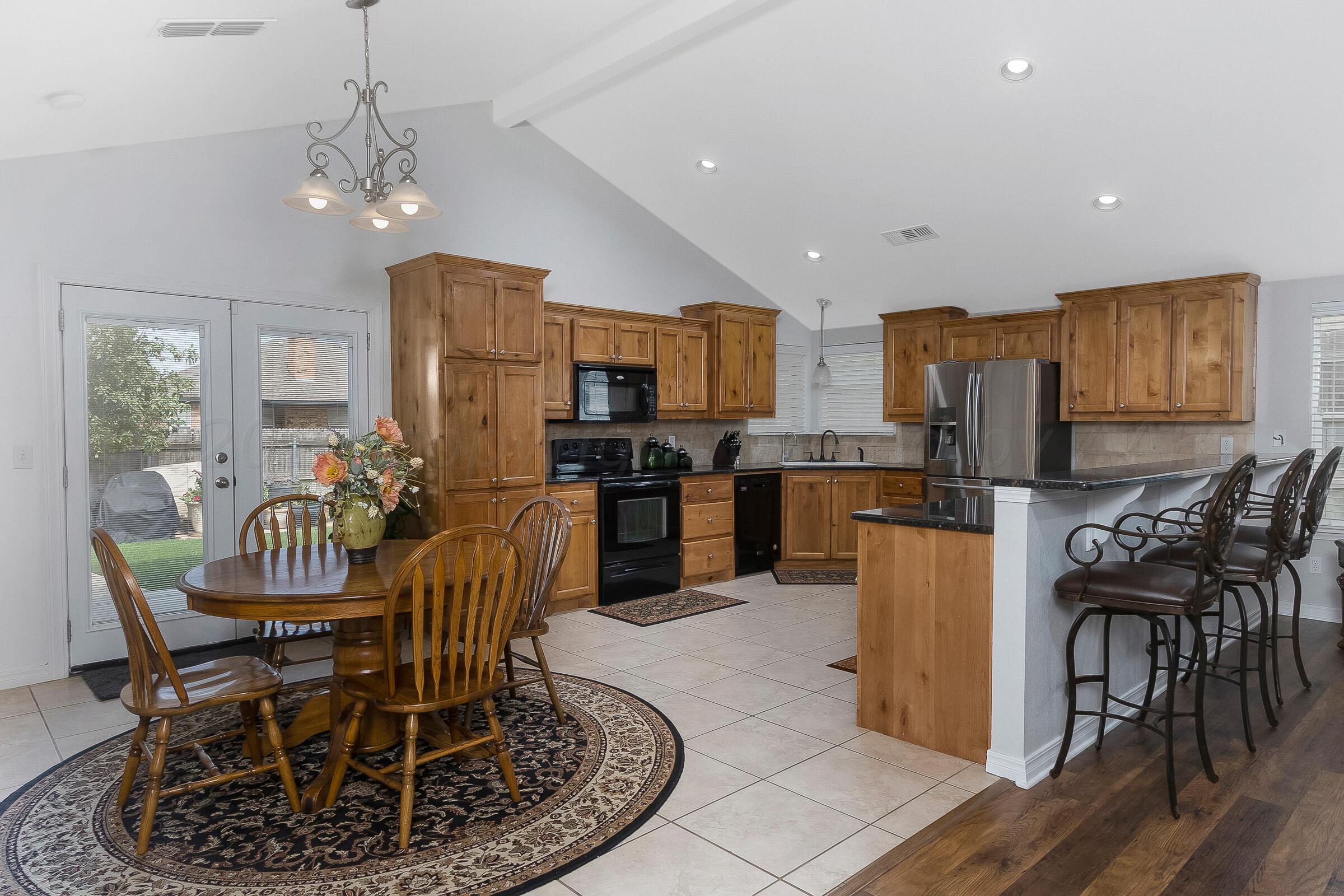 6502 Lexis Street Amarillo, TX 79119 - Photo 6 of 27 a view of a dining room with furniture