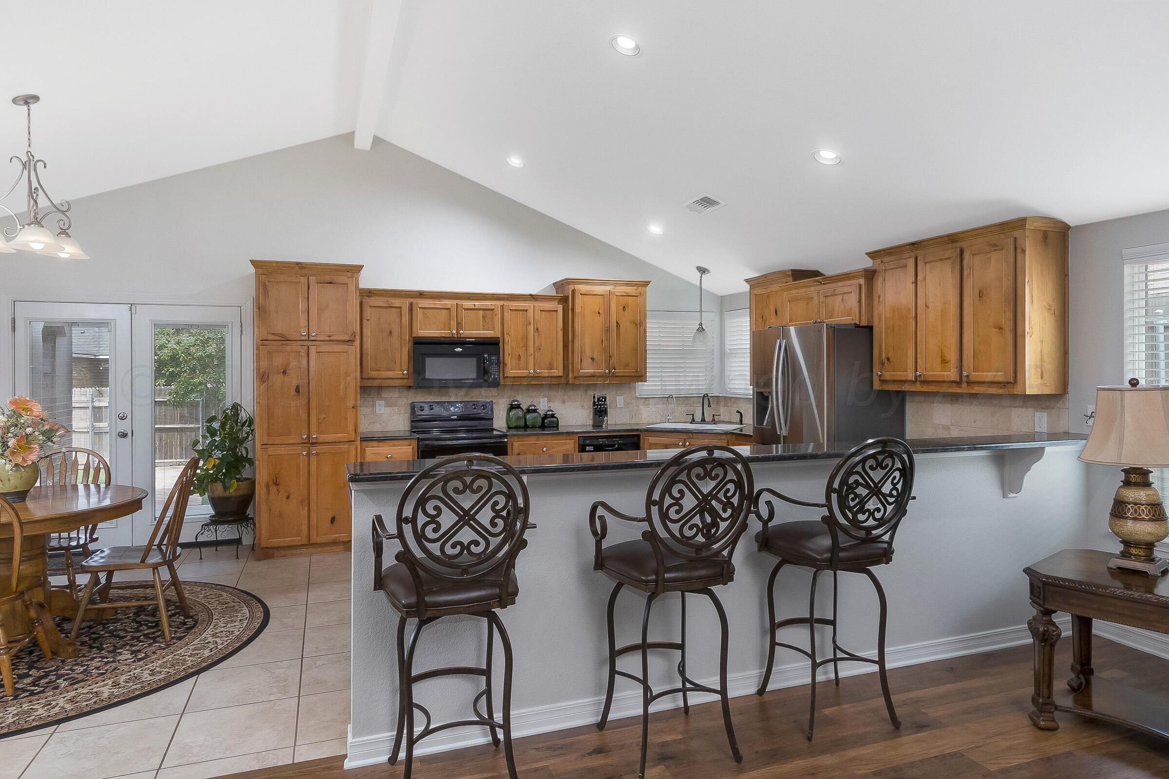 6502 Lexis Street Amarillo, TX 79119 - Photo 7 of 27 a view of a dining room with furniture