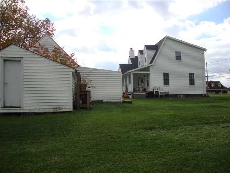 845 Hecla Road Mount Pleasant, PA 15666 - Photo 4 of 18 Exterior Back. back view of home with outbuildings