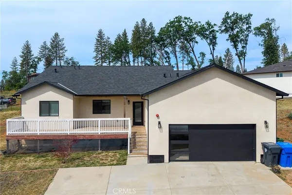 a house view with a outdoor space