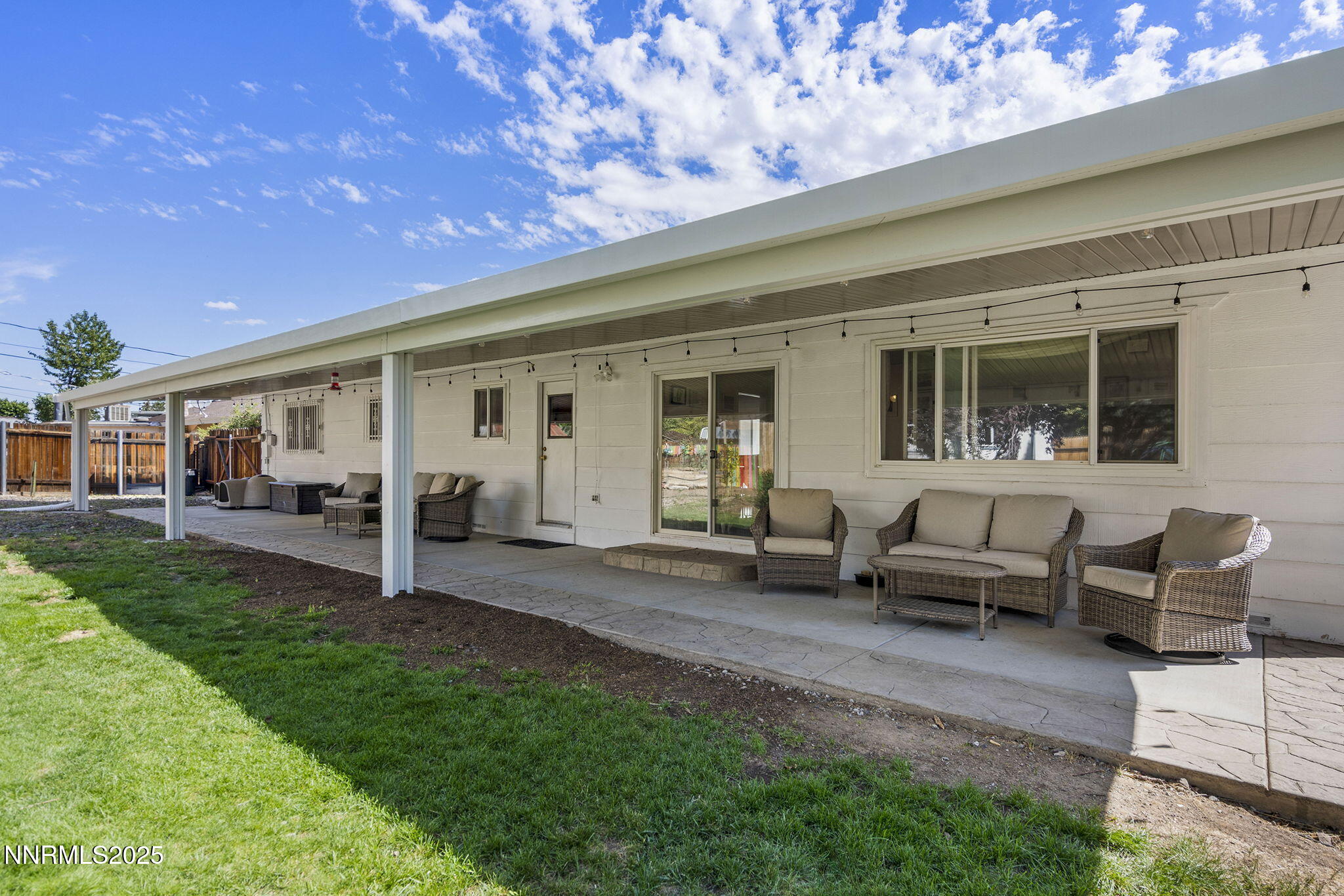 11070 Broken Hill Road Reno, NV 89511 - Photo 29 of 32 a view of a house with backyard sitting area and garden