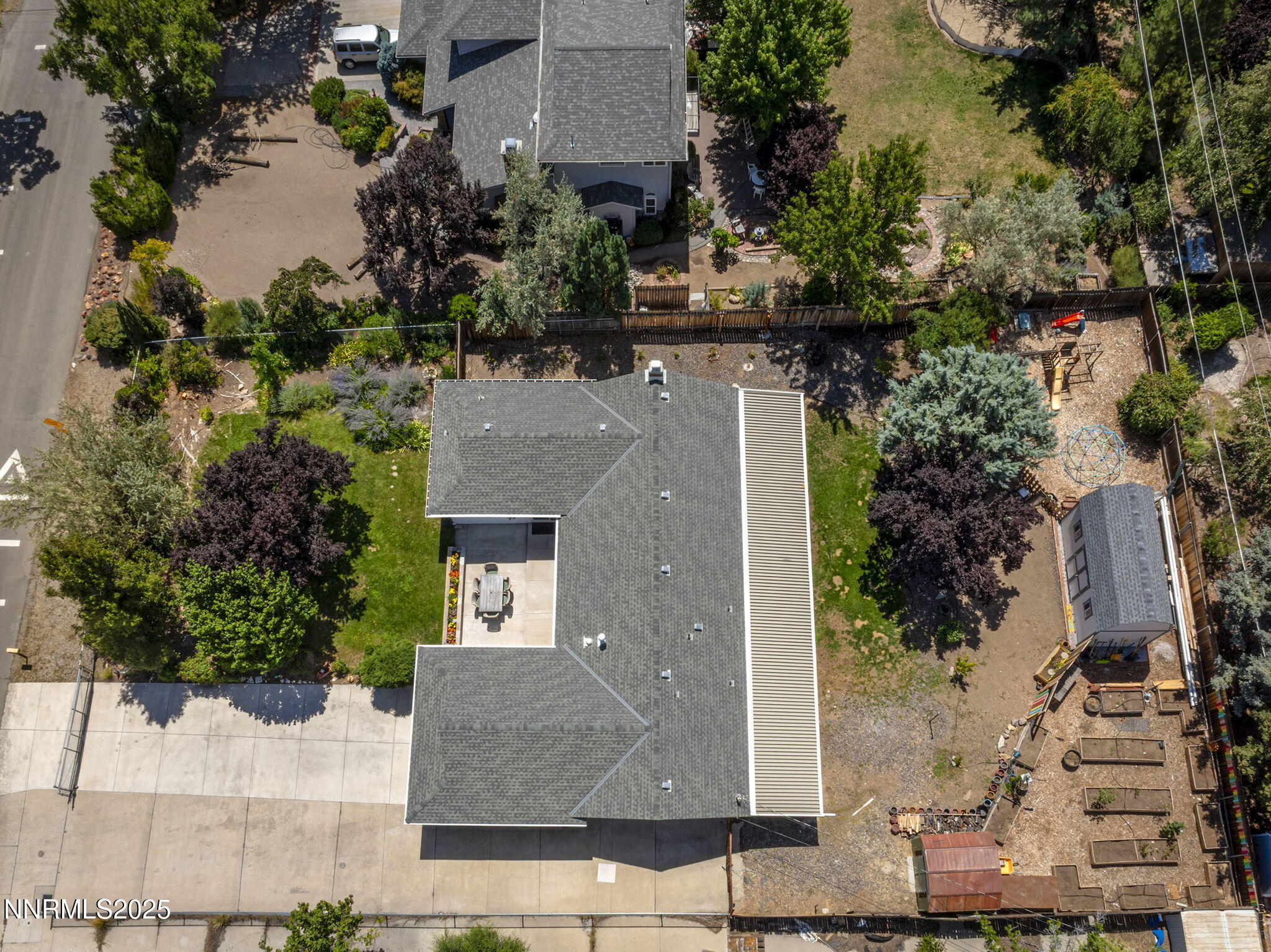 11070 Broken Hill Road Reno, NV 89511 - Photo 5 of 32 an aerial view of a house with a yard and large tree