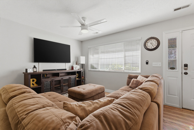 282 West 960 South, Unit C Provo, UT 84601 - Photo 2 of 33 Living room with wood finished floors and ceiling fan