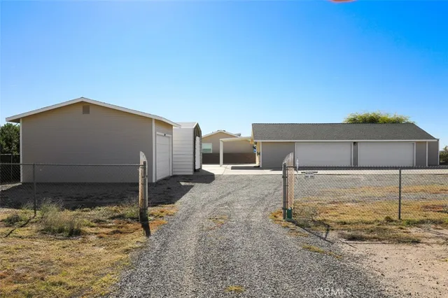 a view of a garage with parked cars