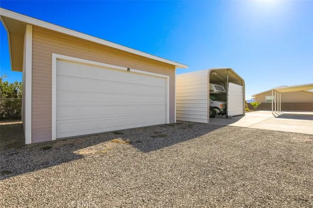 a view of a back yard of the house