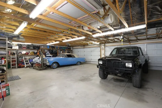 a view of swimming pool with outdoor seating