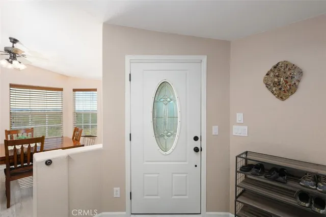 a bedroom with a bed and a bookshelf