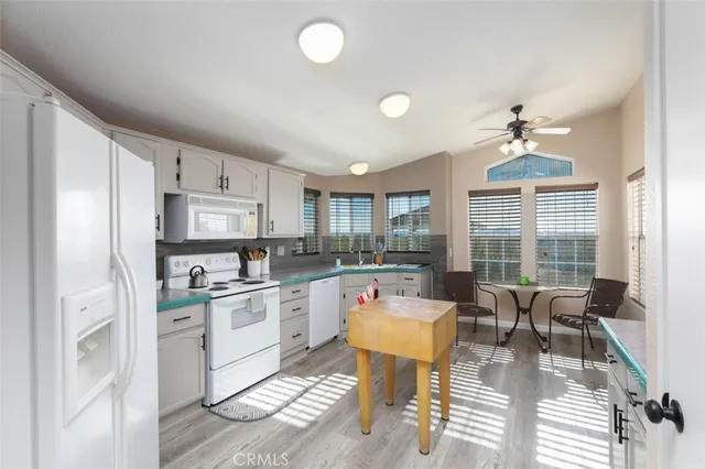 a bathroom with a toilet a sink and a mirror