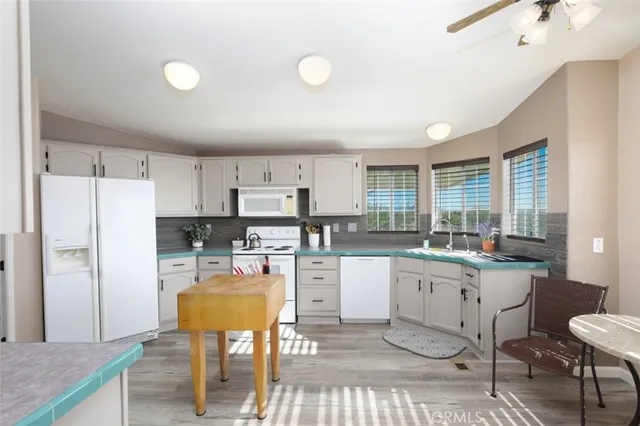 a bedroom with bed and a window