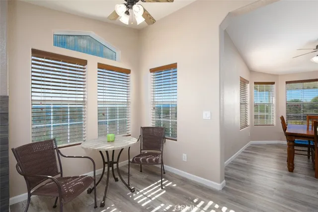 a view of a swimming pool with a lounge chair