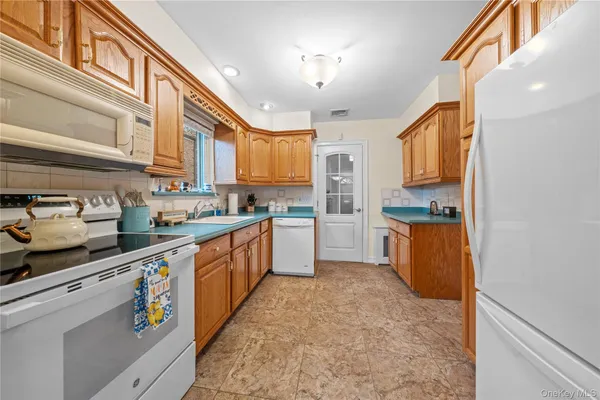 $1,399,000 | 82-10 215th Street | Oakland Gardens